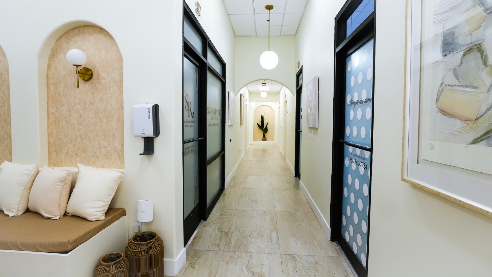 The Suite Haus main hall with arched plant alcove